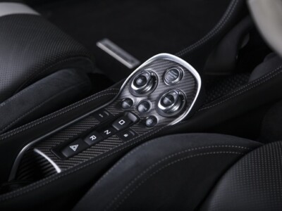 Closeup shot of the engine start buttons inside a modern sport car
